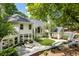 The home's backyard patio is perfect for outdoor entertaining with its water feature and ample space for seating at 625 Wynfield Ct, Roswell, GA 30076
