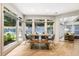 Eat-in kitchen features windows to bring in natural light and views of the outdoor space at 625 Wynfield Ct, Roswell, GA 30076
