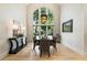 Dining room with natural light and a modern chandelier at 625 Wynfield Ct, Roswell, GA 30076