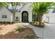 Welcoming front entrance featuring a manicured lawn and stone walkway at 625 Wynfield Ct, Roswell, GA 30076