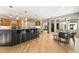 Open-concept kitchen with an island, bar seating, and an eat-in area at 625 Wynfield Ct, Roswell, GA 30076
