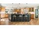 Spacious kitchen with a large island, custom cabinetry, and stainless steel appliances at 625 Wynfield Ct, Roswell, GA 30076