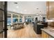 Open-concept kitchen with a large center island, breakfast bar, and adjacent eat-in area at 625 Wynfield Ct, Roswell, GA 30076