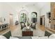 Spacious living area showcasing stylish decor, hardwood floors, and large windows for natural light at 625 Wynfield Ct, Roswell, GA 30076