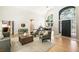 Open living area with large front windows, a neutral color palette, and contemporary furnishings at 625 Wynfield Ct, Roswell, GA 30076