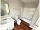 Bathroom view with white cabinets, and shower and bath combo at 6817 Blackstone Pl # 16, Mableton, GA 30126