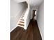 Bright entryway with hardwood floors and a staircase leading to the upper level at 6817 Blackstone Pl # 16, Mableton, GA 30126