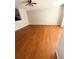 Spacious living room with gleaming hardwood floors and a ceiling fan at 6817 Blackstone Pl # 16, Mableton, GA 30126
