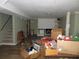 Spacious basement featuring a fireplace, staircase, and plenty of potential for customization at 2448 Sherbrooke Ne Ct, Atlanta, GA 30345