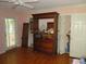 Bedroom offering hardwood floors, natural light from the sliding glass door, and closet at 2448 Sherbrooke Ne Ct, Atlanta, GA 30345