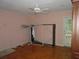 Bedroom with a ceiling fan, closet, and access to the outdoors via a glass door at 2448 Sherbrooke Ne Ct, Atlanta, GA 30345
