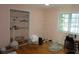 Bright bedroom with a window, closet, and neutral walls, offering a versatile space at 2448 Sherbrooke Ne Ct, Atlanta, GA 30345