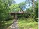 Charming brick ranch home with mature trees and lush landscaping provides privacy at 2448 Sherbrooke Ne Ct, Atlanta, GA 30345