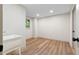 Spacious basement with sink, vinyl flooring, and a window at 5236 Forest Brook Pkwy, Marietta, GA 30068