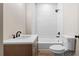 Bathroom with a shower, tub, black hardware and a vanity with storage at 5236 Forest Brook Pkwy, Marietta, GA 30068