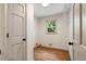 Laundry Room featuring hardwood floors and natural light at 5236 Forest Brook Pkwy, Marietta, GA 30068