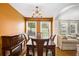 Inviting dining area featuring a stylish chandelier and an abundance of natural light at 7057 Silver Bend Ovrlk, Austell, GA 30168
