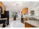 Efficient kitchen featuring great lighting and a classic white tile floor at 7057 Silver Bend Ovrlk, Austell, GA 30168