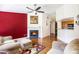 Cozy living room showcasing a fireplace, hardwood floors, and open layout at 7057 Silver Bend Ovrlk, Austell, GA 30168