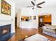 Bright living room showcasing fireplace, hardwood floors, and an open floor plan at 7057 Silver Bend Ovrlk, Austell, GA 30168