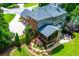 Spacious home featuring an outdoor patio, screened porch, and two-car garage at 141 Olde Heritage Way, Woodstock, GA 30188
