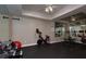 Well-equipped home gym with mirrors and exercise equipment at 141 Olde Heritage Way, Woodstock, GA 30188