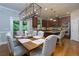 Gourmet kitchen featuring custom cabinets, stainless steel appliances, and a central island at 141 Olde Heritage Way, Woodstock, GA 30188