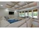 Cozy living room with modern decor, hardwood floors, and a large sofa at 141 Olde Heritage Way, Woodstock, GA 30188