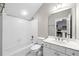Bathroom featuring a tub/shower combo, toilet and vanity with sink at 2412 St Davids Sq # 16, Kennesaw, GA 30152