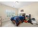 Well-lit bedroom featuring a cozy bed and ample natural light from the window at 2412 St Davids Sq # 16, Kennesaw, GA 30152