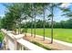 Outdoor deck featuring a view of a lush green yard and tall trees at 2412 St Davids Sq # 16, Kennesaw, GA 30152