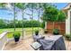 Outdoor deck with a view of a lush green yard and tree line at 2412 St Davids Sq # 16, Kennesaw, GA 30152