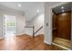 Hallway features a wood-paneled elevator, stairway and door to the laundry room at 2412 St Davids Sq # 16, Kennesaw, GA 30152