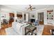Open floor plan with living room, dining area, kitchen and hardwood floors at 2412 St Davids Sq # 16, Kennesaw, GA 30152