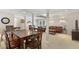 Spacious basement area with a dining table, leather sofas, and a TV, ideal for entertaining and relaxation at 3841 Admiral Dr, Atlanta, GA 30341
