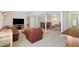 Open basement living area featuring a TV, leather furniture, and a play area, great for Gathering entertainment at 3841 Admiral Dr, Atlanta, GA 30341