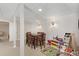 Basement recreational area with a dining table, chairs, and a play area, perfect for gatherings and ' activities at 3841 Admiral Dr, Atlanta, GA 30341