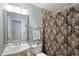 Bathroom featuring a modern mirror, vanity, and a shower with a patterned curtain at 3841 Admiral Dr, Atlanta, GA 30341