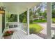 Cozy front porch featuring a swing and a view of the surrounding greenery and neighborhood at 3841 Admiral Dr, Atlanta, GA 30341