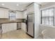 Well-lit kitchen with stainless steel appliances, granite countertops, and ample cabinet space at 3841 Admiral Dr, Atlanta, GA 30341