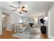 Cozy living room with a fireplace, comfortable seating, and a view of the backyard at 3841 Admiral Dr, Atlanta, GA 30341