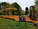 Community playground featuring slides, climbing structures, and covered seating, for neighborhood Gathering fun at 3841 Admiral Dr, Atlanta, GA 30341