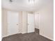 Cozy bedroom with neutral walls, carpeted floors, and two closets at 793 Springdale Sw, Atlanta, GA 30315