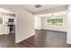 Open floor plan showcasing dark hardwood floors connecting the living room and kitchen at 793 Springdale Sw, Atlanta, GA 30315