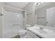 Bright bathroom boasts a shower-tub combo and a sleek vanity with ample counter space at 1804 Evadale Ct # 1, Mableton, GA 30126