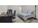 Cozy bedroom features natural light, dark wood floors, and space for a desk and workspace at 1804 Evadale Ct # 1, Mableton, GA 30126