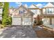 Attractive townhome with stone accents, offering a two-car garage and appealing curb appeal at 1804 Evadale Ct # 1, Mableton, GA 30126