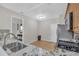 Bright kitchen showcasing stainless steel appliances, granite countertops and hardwood floors at 1804 Evadale Ct # 1, Mableton, GA 30126
