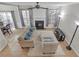 Spacious living area featuring tile flooring, a fireplace, and sliding doors to the outside at 1804 Evadale Ct # 1, Mableton, GA 30126