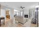 Cozy living room featuring a fireplace, neutral decor, and open access to the kitchen at 1804 Evadale Ct # 1, Mableton, GA 30126